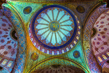 Istanbul, Turkey - March 23 2014: The splendid mosaic tiles decorated dome in Blue Mosque in...