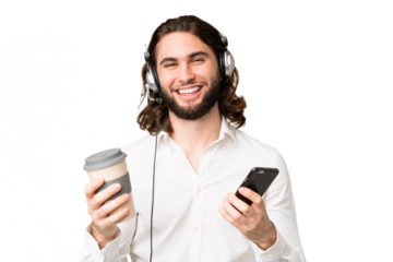 Telemarketer man working with a headset over isolated chroma key background holding coffee to take away and a mobile