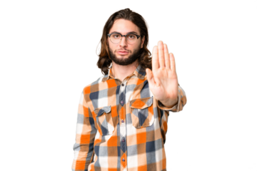 Young handsome man over isolated chroma key background making stop gesture