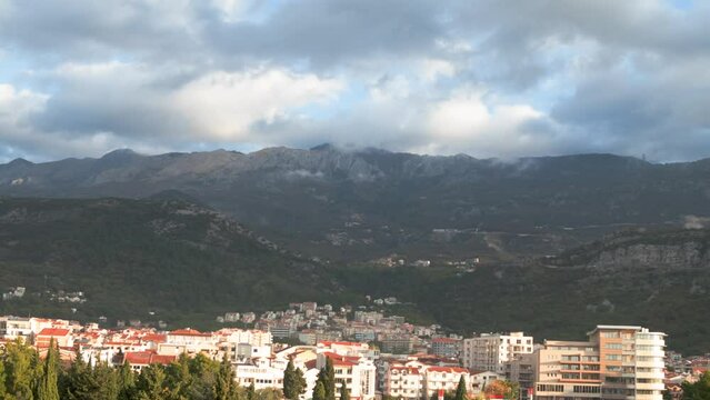 Budva skyline timelapse with clouds and mountains, Montenegro

