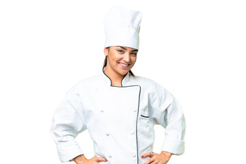 Young woman Chef over isolated chroma key background laughing