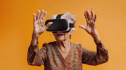 Waving Senior woman wearing VR headset on orange background