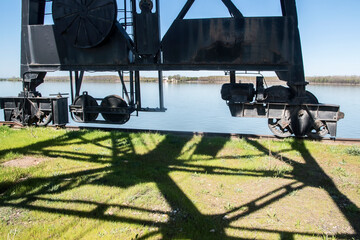 The lower load-bearing part of vintage port industrial crane closeup