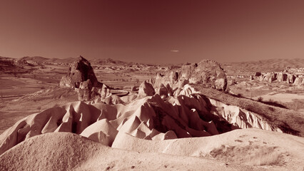 G&ouml;reme, Turkey - March 21 2014: Cone shaped Rock formation so called fairy Chimneys in Paşabağ Valley of Cappadocia