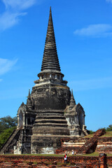 Fototapeta premium Ruins of a burned Buddhist stupa temple, Wat Maha That