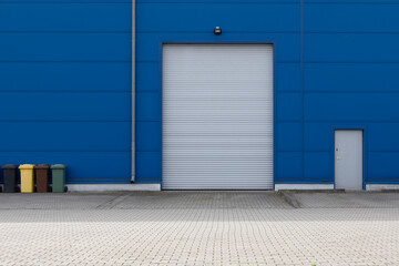 Bright Blue Warehouse Shutter Entrance