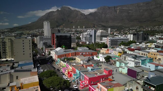 View of the colorful Bo-Kaap in Cape Town, South Africa. A popular daytime destination, hillside Bo-Kaap is known for its narrow cobbled streets lined with colorful houses
