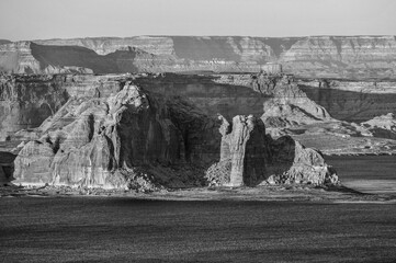 Black and white view of the buttes and cliffs around Lake Powell, over the state border in Utah,...
