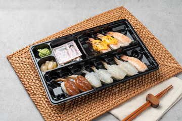 Japanese, sushi, sashimi, fish, eel, shrimp, flatfish, rockfish, salmon, sashimi rice, raw salmon, fried tofu rice, soy sauce, wasabi, egg roll, onion, flying fish egg