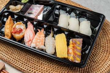 Japanese, sushi, sashimi, fish, eel, shrimp, flatfish, rockfish, salmon, sashimi rice, raw salmon, fried tofu rice, soy sauce, wasabi, egg roll, onion, flying fish egg