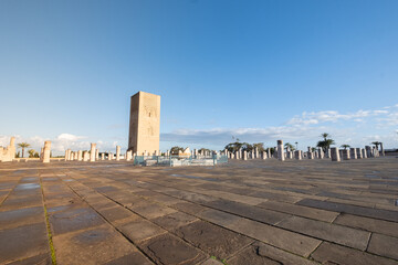 Sunrise at the Mausoleum of Mohammed V. It's a royal tomb located in Rabat, the capital of Morocco. The mausoleum houses the tomb of King Mohammed V, and his sons Hassan II and Mulay Abdella - obrazy, fototapety, plakaty