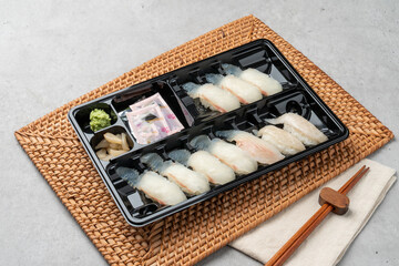 Japanese, sushi, sashimi, fish, eel, shrimp, flatfish, rockfish, salmon, sashimi rice, raw salmon, fried tofu rice, soy sauce, wasabi, egg roll, onion, flying fish egg