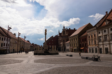 Breathtaking view of enchanting Glavni trg square located in the heart of the charming old town of Maribor, Slovenia, Europe. Scenic pedestrian area with architectural landmarks. Tourism, sightseeing - obrazy, fototapety, plakaty
