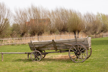 Old wooden cart wagoon in countryside