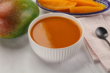 Sweet mango puree in the bowl