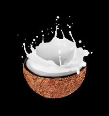 Sliced half of coconut with milk splashes isolated on a black background