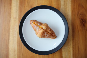  Smoked Beef Croissant On table background 