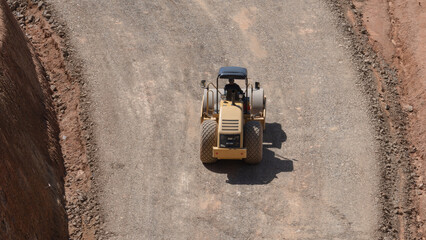 Road rollers are being used in road construction projects