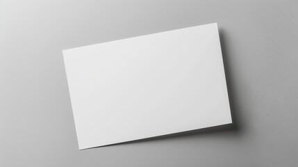 A blank white paper on a gray background