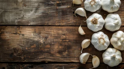 Poster Garlic laying on wooden table cooking recipe banner concept © PrettyVectors