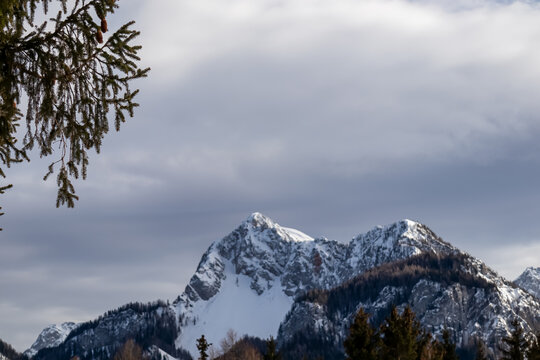 Scenic view of snow capped mountain peak Kosiak in Karawanks, Carinthia, Austria. Winter wonderland in Austrian Alps. Remote alpine landscape in Baerental. Tranquil and serene atmosphere in nature
