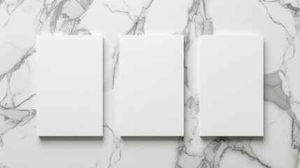 Three blank white cards on marble surface. Suitable for business presentations