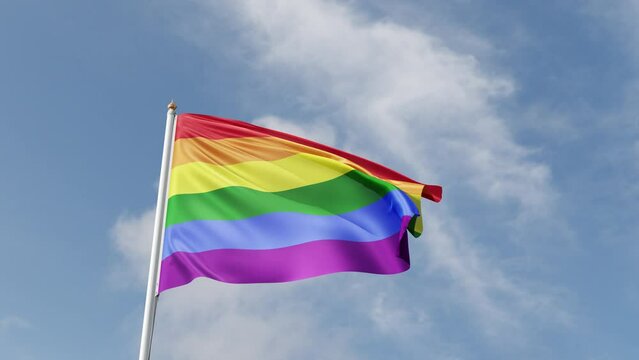 gay pride flag, waving in the wind, lgbt flag on a blue sky, tall flagpole, lgbtqia, queer, symbol of the gay pride, tolerance, love	