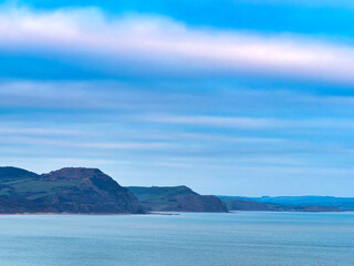 The moods of the jurassic coastline with Lyme Bay captured on January evenings from Lyme Regis in Dorset