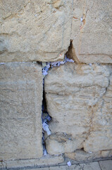 Prayer notes in the Western Wall in Jerusalem, Israel, Palestine. Prayers & Wishes at the Western Wall (Wailing Wall) in Jerusalem.