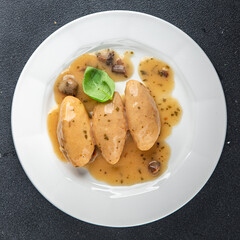 quenelles pork sauce mushroom food on a plate eating cooking appetizer meal food snack on the table copy space food background