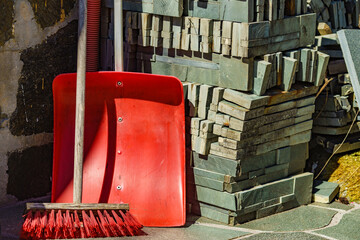 Red broom and shovel outdoor
