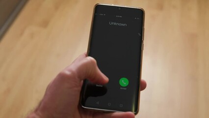 Unknown call from scammers on a mobile phone.