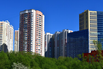 City houses surrounded by trees in Moscow, Russia