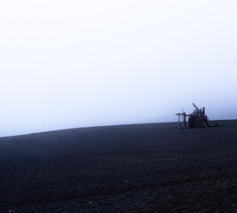 Hut on foggy beach