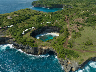 Aerial view of Broken Beach hidden inside a rock cliff