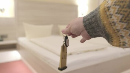 keys in female hand, hotel bedroom with neatly made bed covered in clean white linens, , room rental, comfort and relaxation, Hotel Service and Hospitality, Tourism and Travel, restful night's sleep