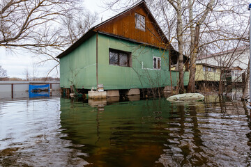 Flooded rural houses. Concept of disaster