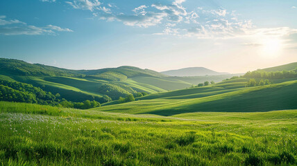 A peaceful countryside landscape with rolling hills and a clear blue sky.