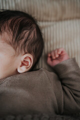 Baby sleeping side of the face (ear)
