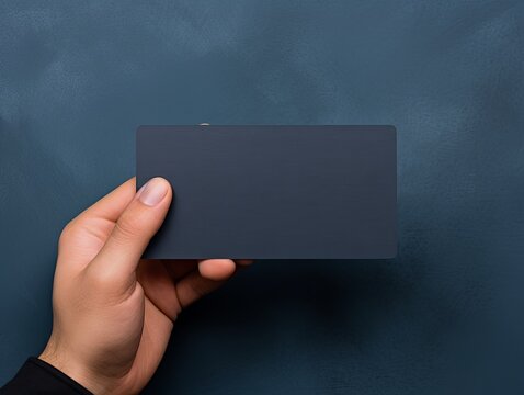 Navy Blue blank business card template empty mock-up at navy blue textured background with copy space for text photo or product 