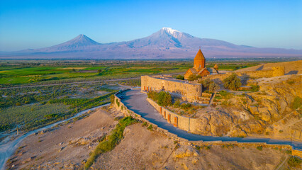 Sunrise view of Khor Virap Monastery standing in front of Ararat moutain in Armenia
