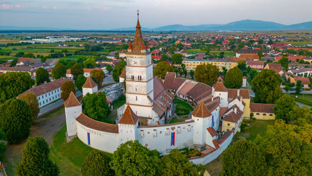 Sunset view of the Fortified Evangelical Church in Harman, Romania