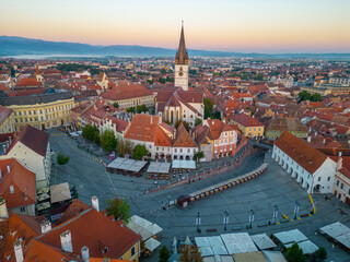 Naklejka premium Sunrise panorama of Piata Mica in Sibiu, Romania