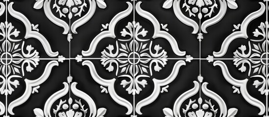 Detailed view of a black and white ceramic tile showcasing an intricate geometric pattern
