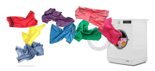 Washing machine and flying clothes on white background