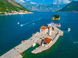 Aerial view of Church of Our Lady of Skrpjela and Saint George Catholic Monastery near Perast in...