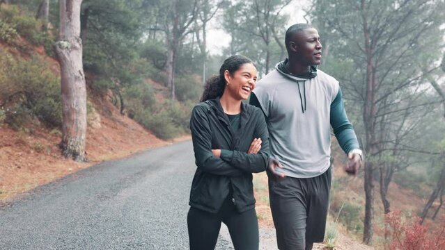 Happy couple, fitness and laughing together in outdoor nature for adventure trail, exercise and wellness. Forest, black man and partner for healthy body, cardio workout and explore on morning walk