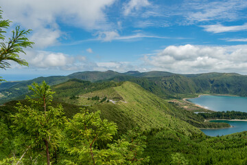 Panoramic landscape with mountains and crater and aerial view of Fire Lagoon, São Miguel - Azores PORTUGAL