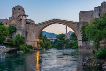 Fototapeta na wymiar Sunrise view of the old Mostar bridge in Bosnia and Herzegovina