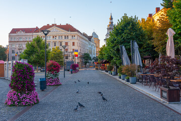 Sunset view of Piata Unirii square in the old town of Cluj-Napoca, Romania